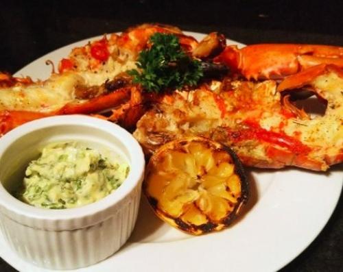 Homard grillé au beurre à l'ail et au citron | Photo de PassionRecettes