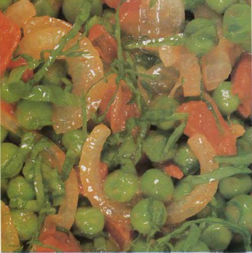 Petits pois aux tomates de Qu'est-Ce Qu'on Mange | Photo de PassionRecettes