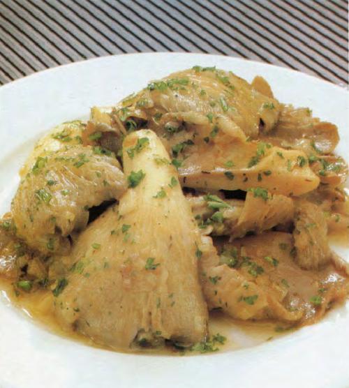 Pleurotes sautées à l'ail de Qu'est-Ce Qu'on Mange | Photo de PassionRecettes