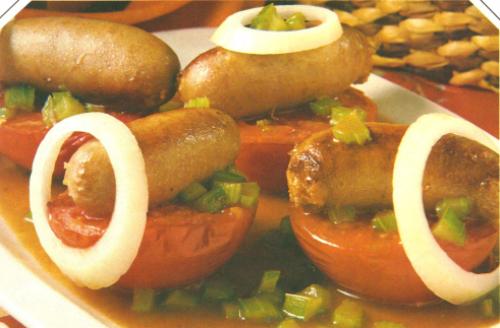 Saucisses de porc aux tomates de Pol Martin | Photo de PassionRecettes