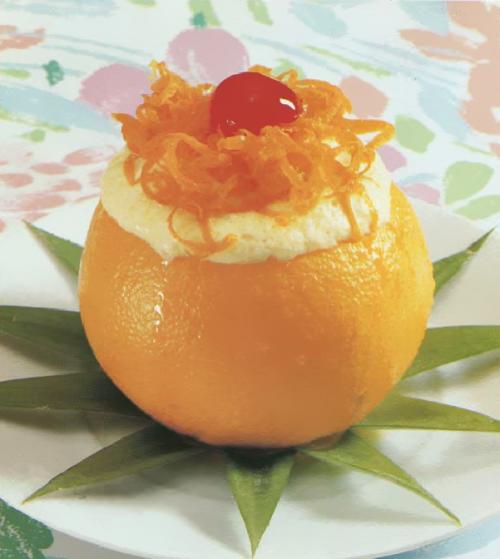 Mousse à l'orange en coquilles d'agrumes de Qu'est-Ce Qu'on Mange | Photo de PassionRecettes