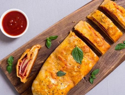 Pain farci à la saucisse (style stromboli) | Photo de PassionRecettes